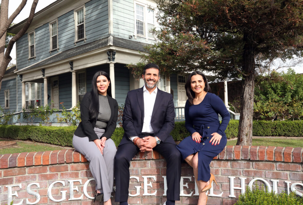 Bell City Council candidates Francis Flores, Ali Saleh and Monica Arroyo outside the George Bell House historical site in Bell, CA